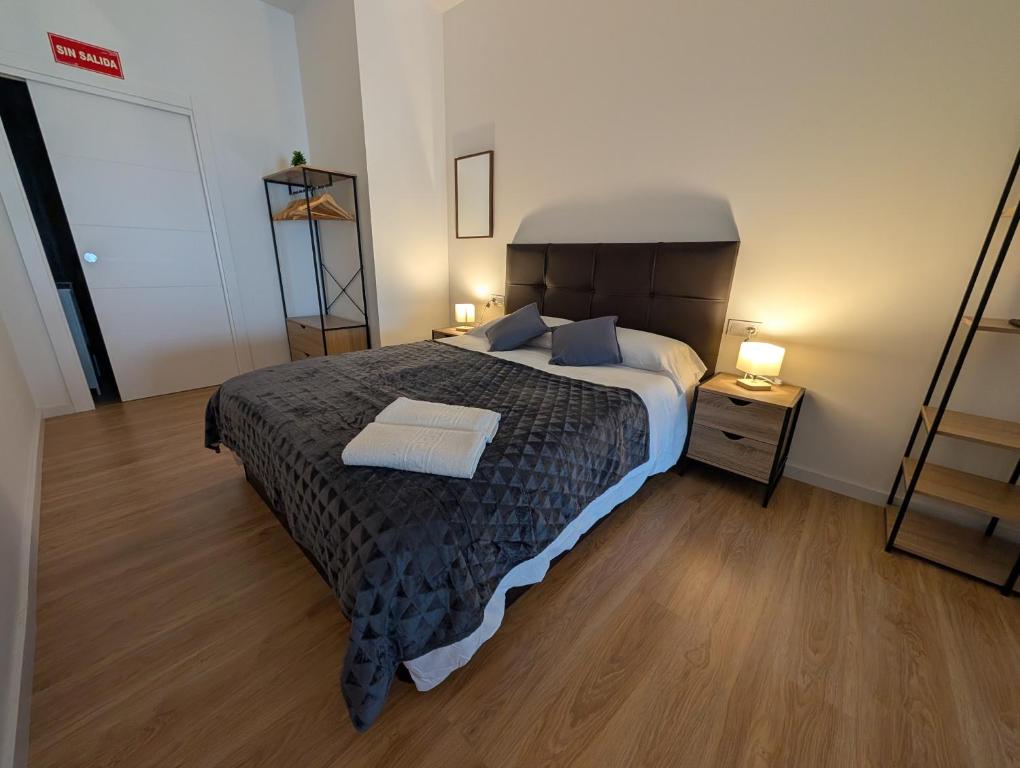 Кровать или кровати в номере Apartamento Ballena