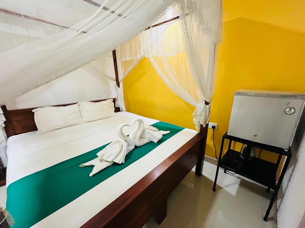 Palitha Homestay - Deluxe Driepersoonskamer