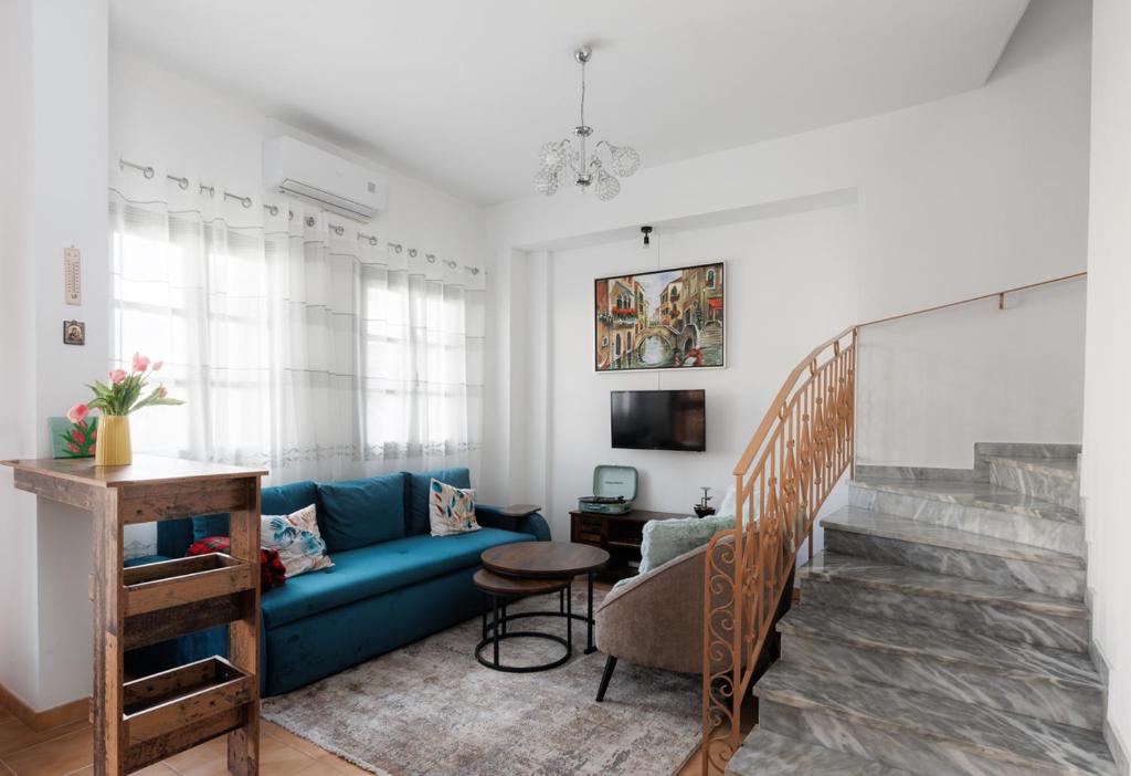 TV a/nebo společenská místnost v ubytování Εν Καρδιά