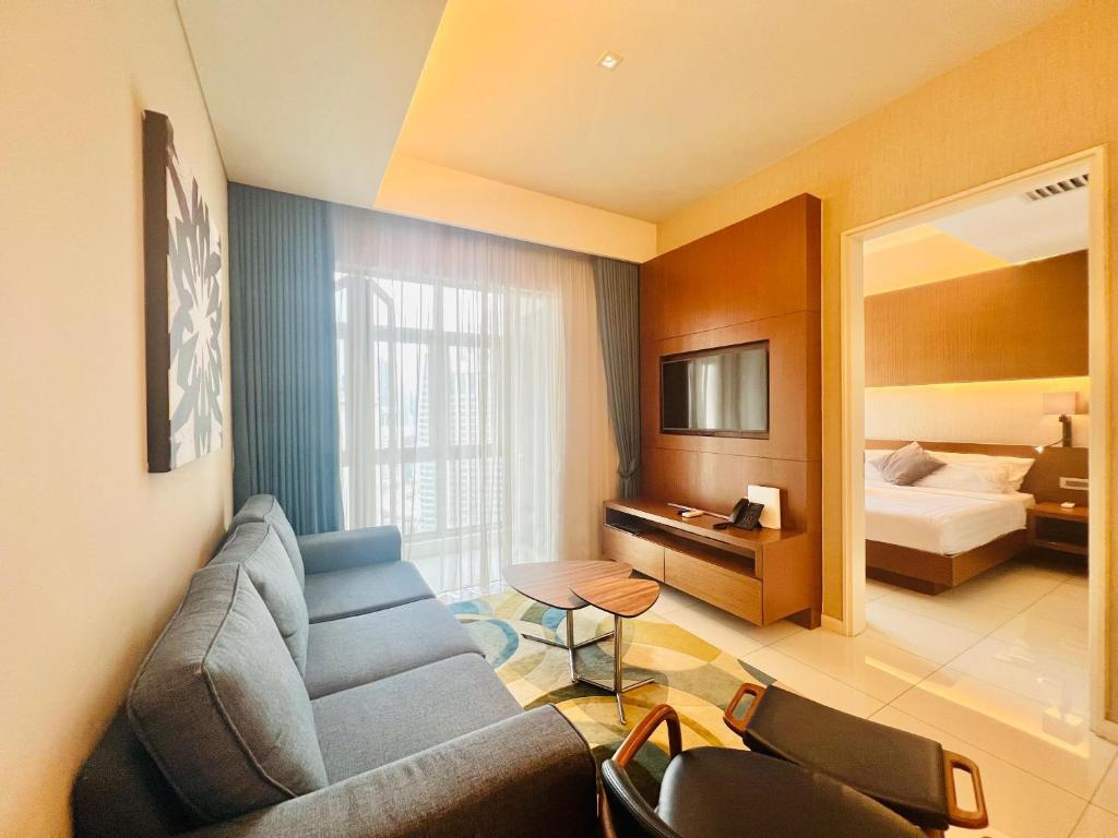 Postel nebo postele na pokoji v ubytování Tribeca Homestay Bukit Bintang TRX