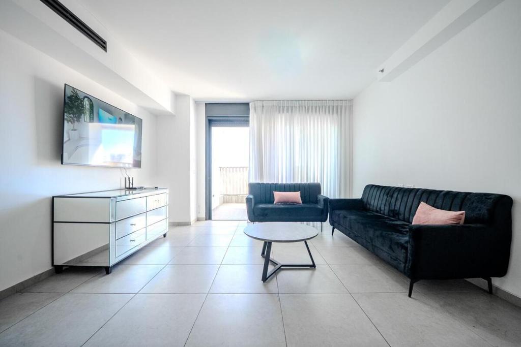 Χώρος καθιστικού στο Luxury 5 Rooms Apartment with elevator