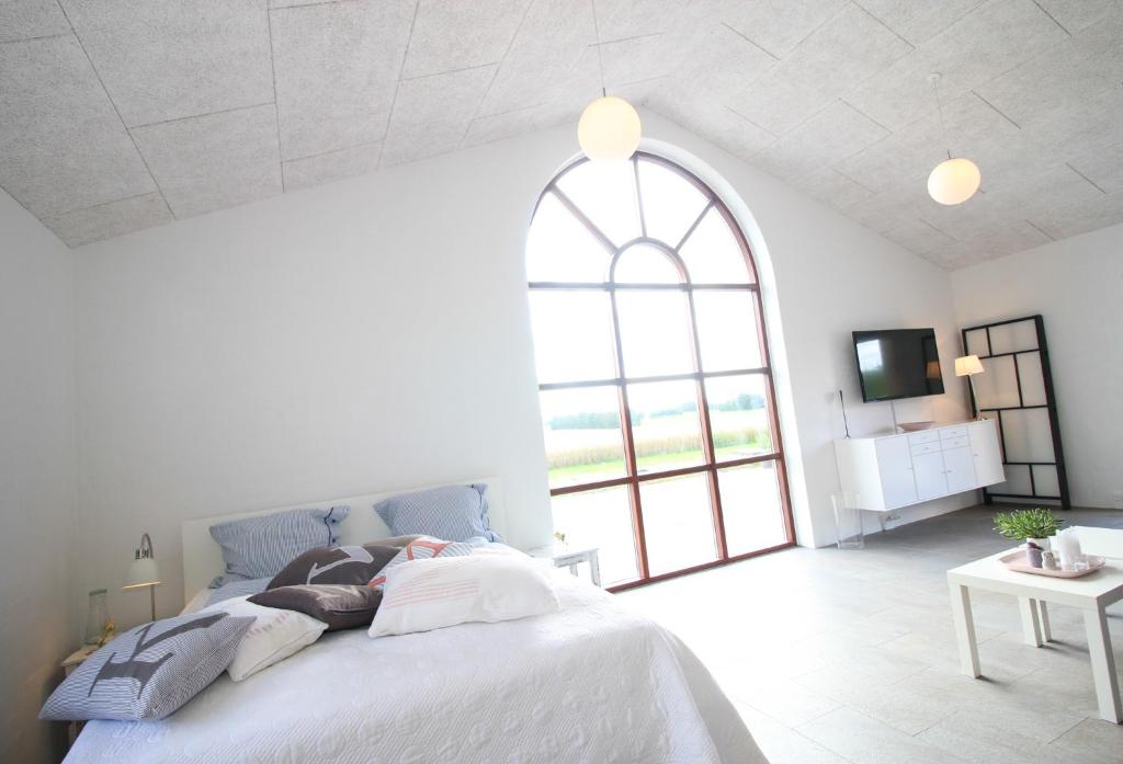 Postel nebo postele na pokoji v ubytování Sellebjerg Apartment