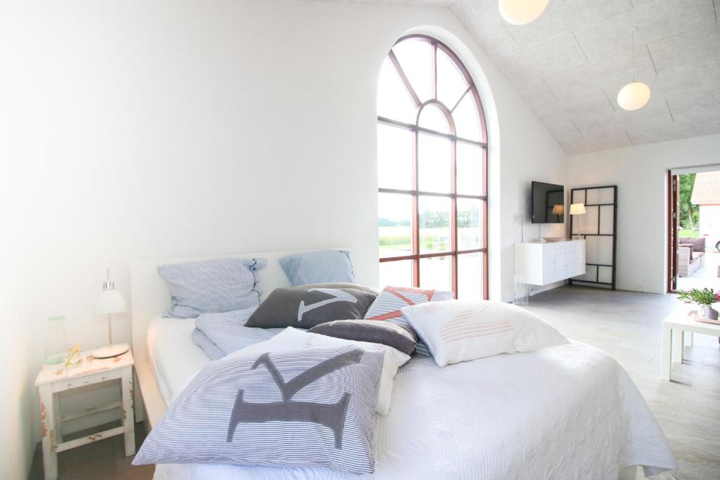 Postel nebo postele na pokoji v ubytování Sellebjerg Apartment