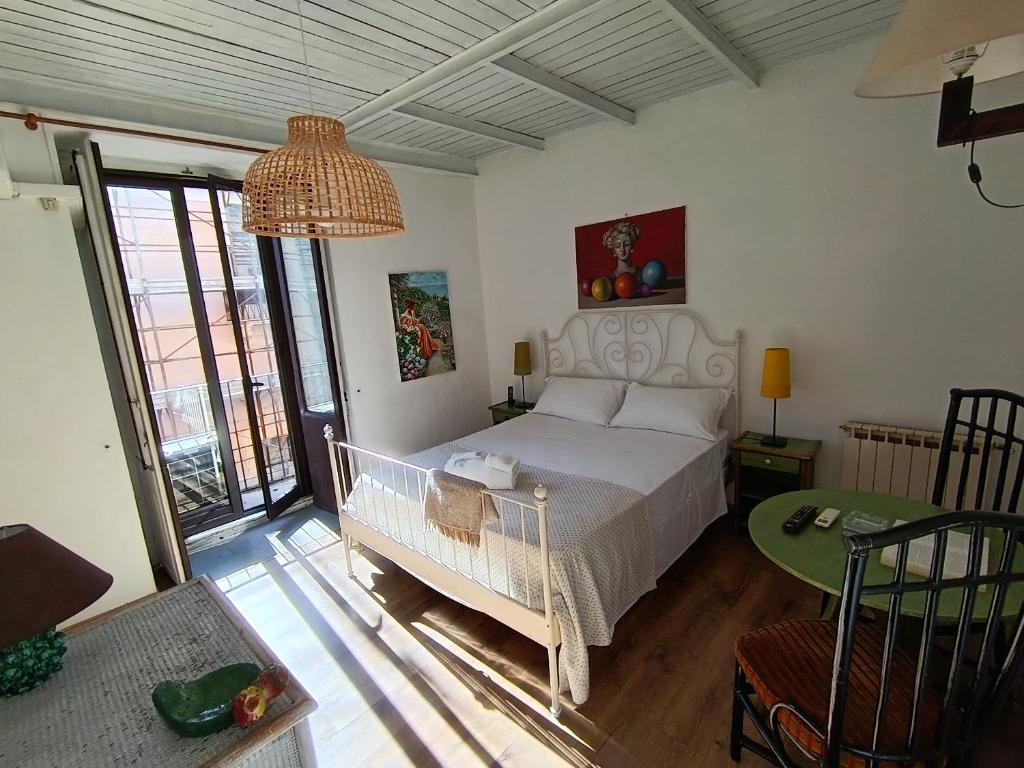 Ένα ή περισσότερα κρεβάτια σε δωμάτιο στο I Vespri