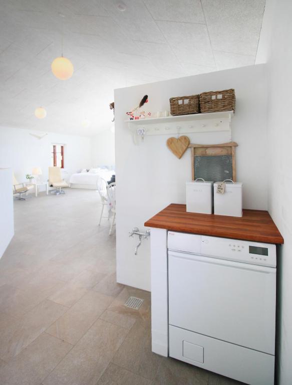 Kuchyň nebo kuchyňský kout v ubytování Sellebjerg Apartment