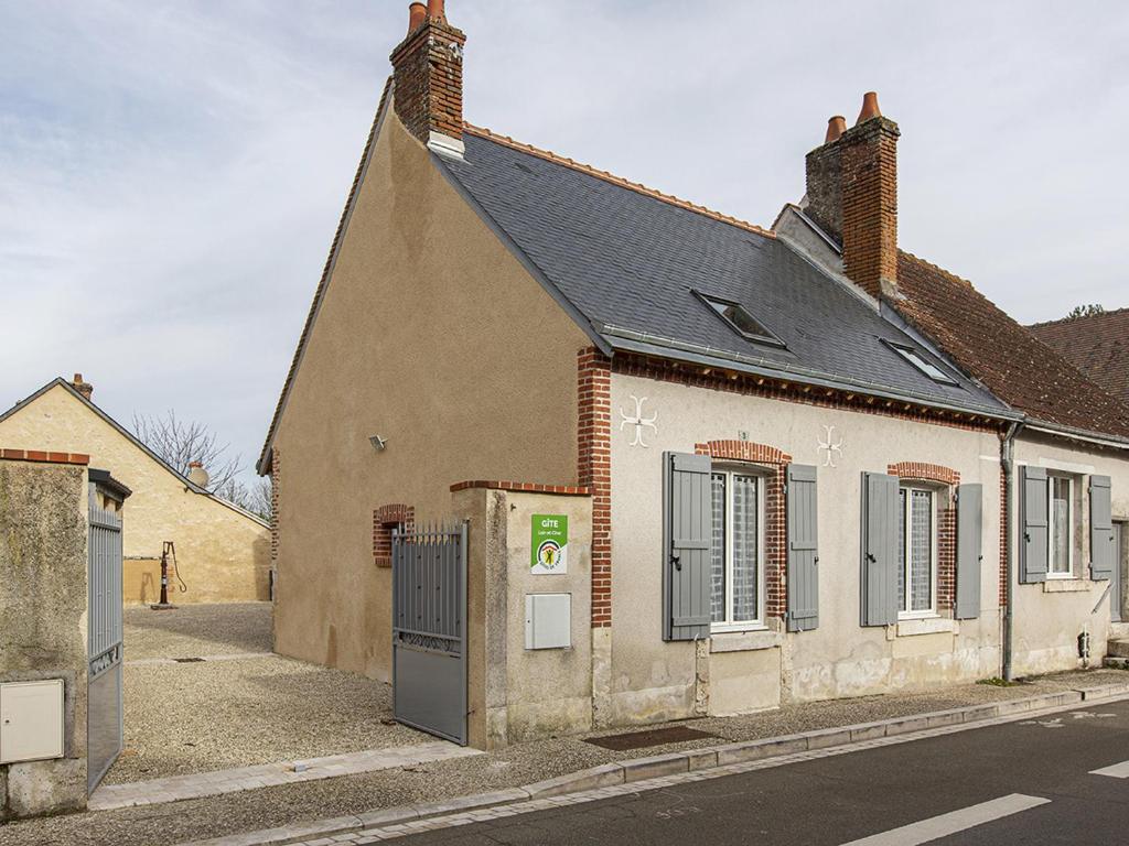 an old building on the side of a street at Gîte de l'Argonne - FR-1-491-391 in Cheverny