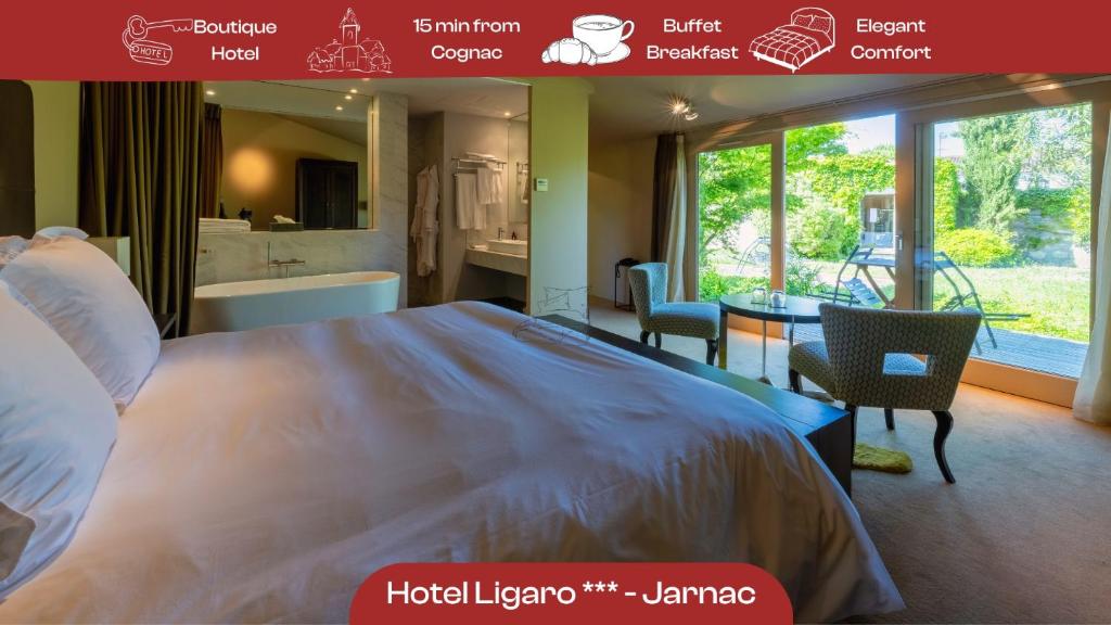 Postel nebo postele na pokoji v ubytování Hotel Ligaro - Jarnac