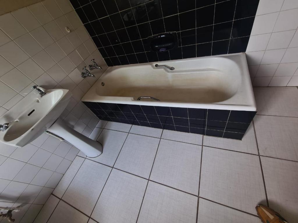 Koupelna v ubytování Uptown Inn GuestHouse