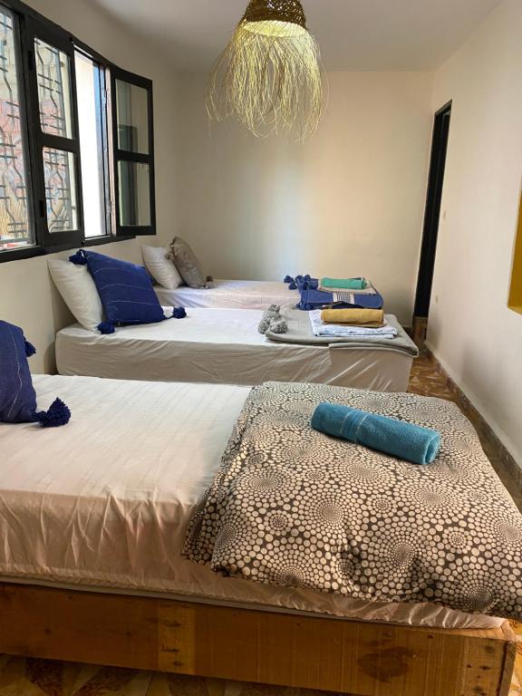 Ένα ή περισσότερα κρεβάτια σε δωμάτιο στο Yuba Surf Morocco