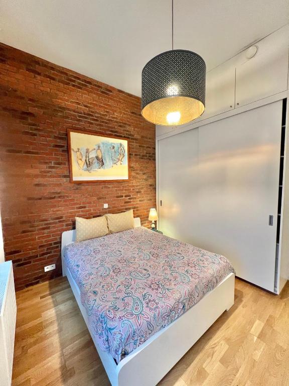 Una cama o camas en una habitación de Hyper centre appartement brussels