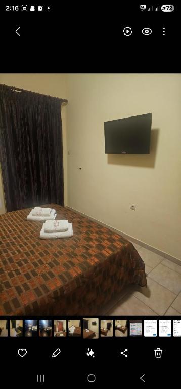 Ένα ή περισσότερα κρεβάτια σε δωμάτιο στο Diakopto One