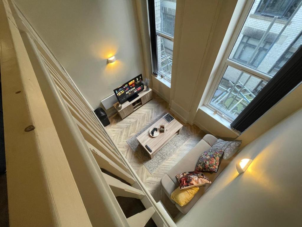 Postel nebo postele na pokoji v ubytování Central Leeds Apartment Oasis