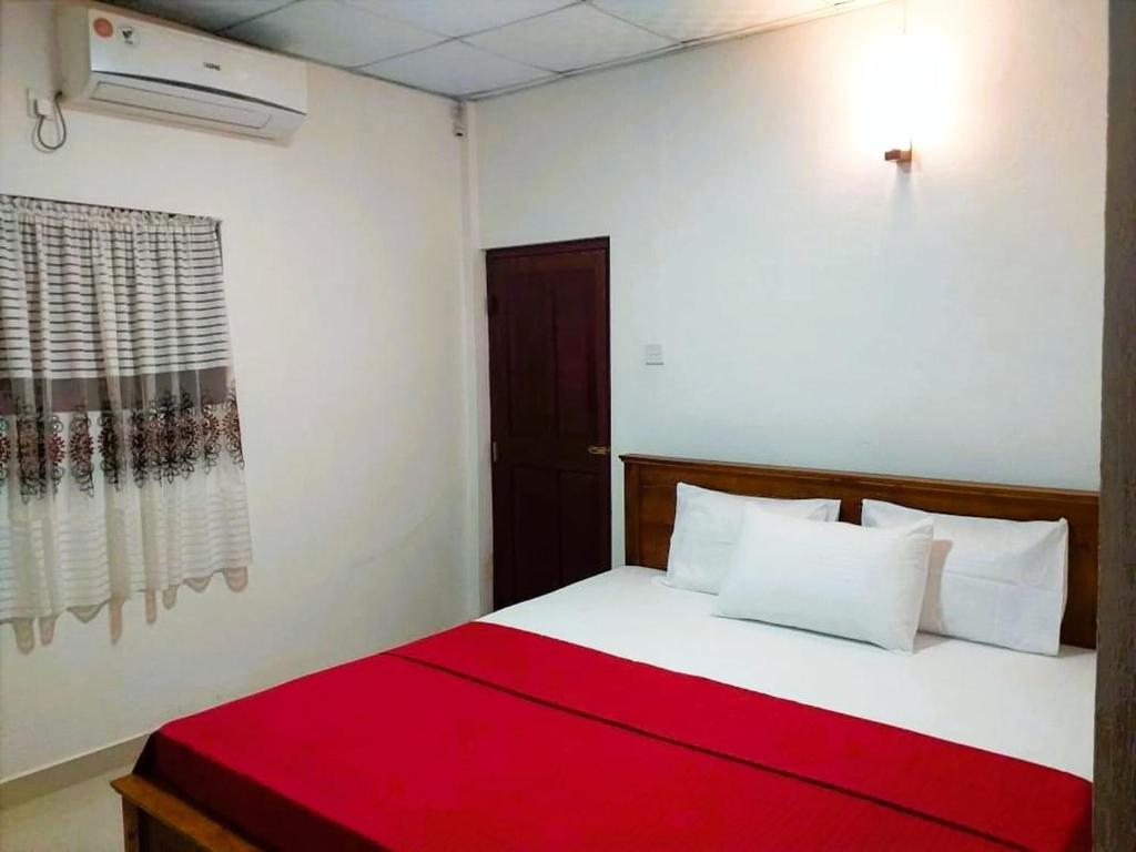 Кровать или кровати в номере Dutch pearl Cottage