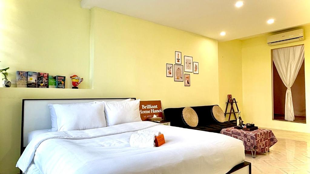 Ένα ή περισσότερα κρεβάτια σε δωμάτιο στο Hanoi Brilliant Home