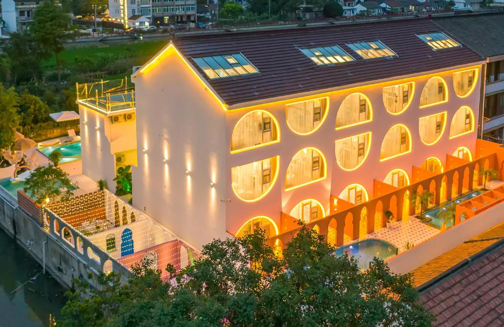 an aerial view of a large building with windows at Shanghai Half-Window Hotel in Shanghai