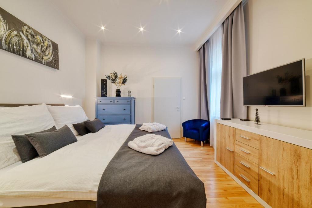 Ένα ή περισσότερα κρεβάτια σε δωμάτιο στο Apartment Luxury