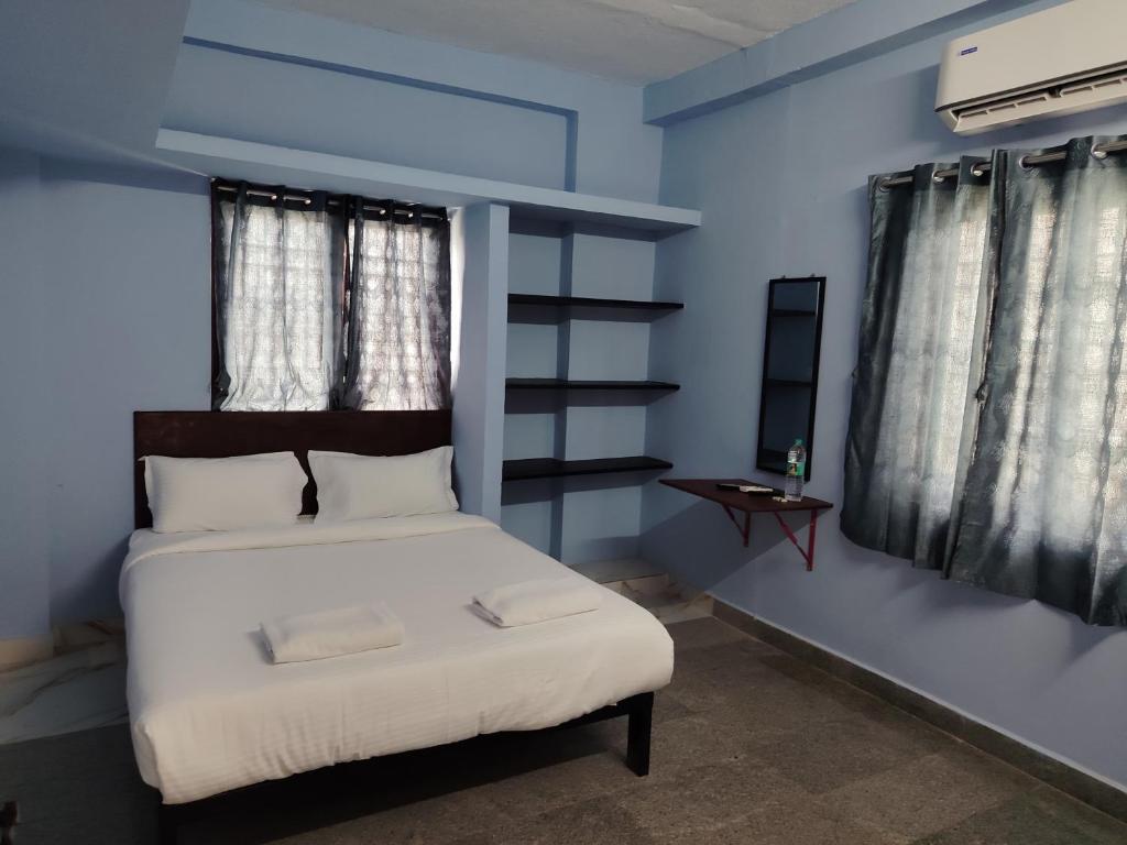 Ένα ή περισσότερα κρεβάτια σε δωμάτιο στο Hotel O Dream inn