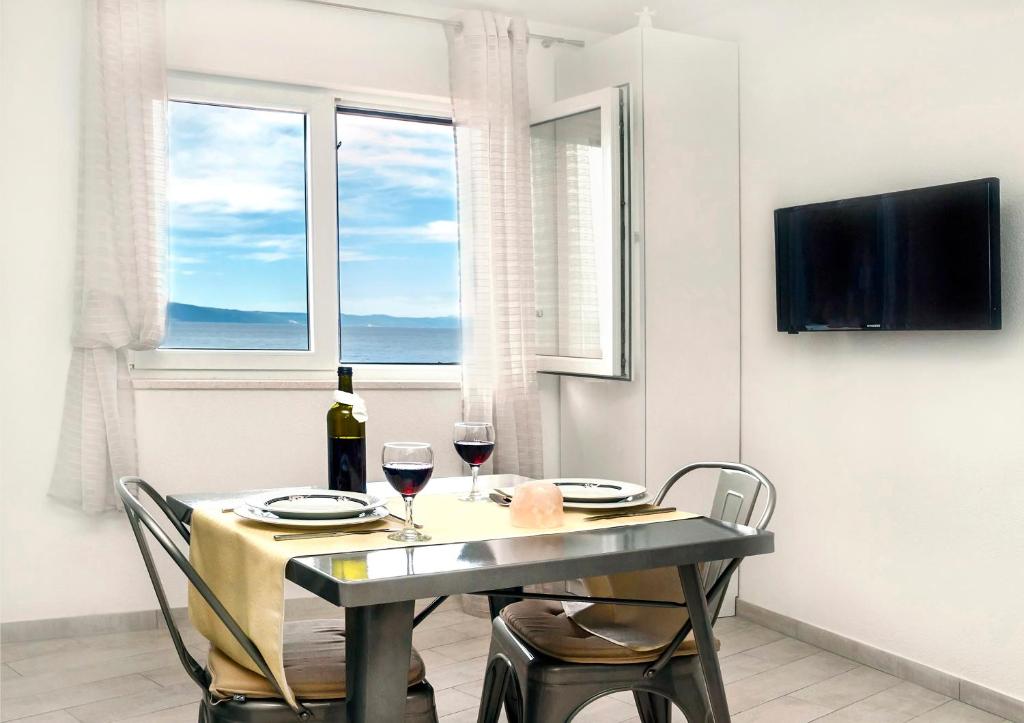 TV a/nebo společenská místnost v ubytování Holiday home Ika