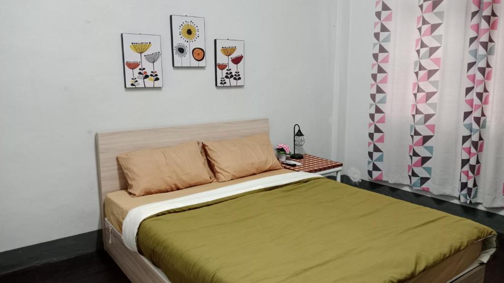 Ένα ή περισσότερα κρεβάτια σε δωμάτιο στο PK101 Room