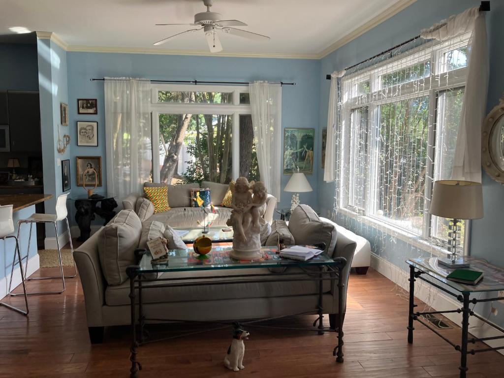 a living room with a couch and a table at Rehoboth Beach Haven in Rehoboth Beach