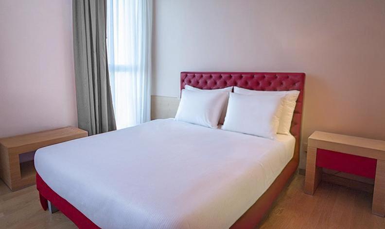 Postel nebo postele na pokoji v ubytování B&B HOTEL Remilia