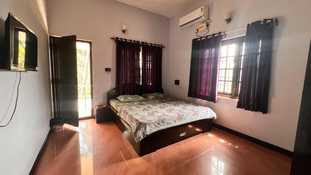 Ένα ή περισσότερα κρεβάτια σε δωμάτιο στο Zeno Villa