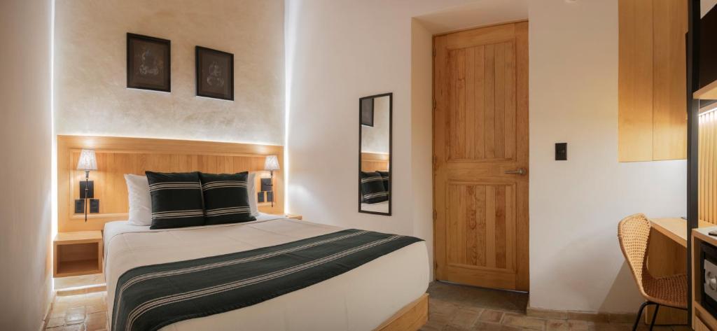 Ένα ή περισσότερα κρεβάτια σε δωμάτιο στο Casa Ziña