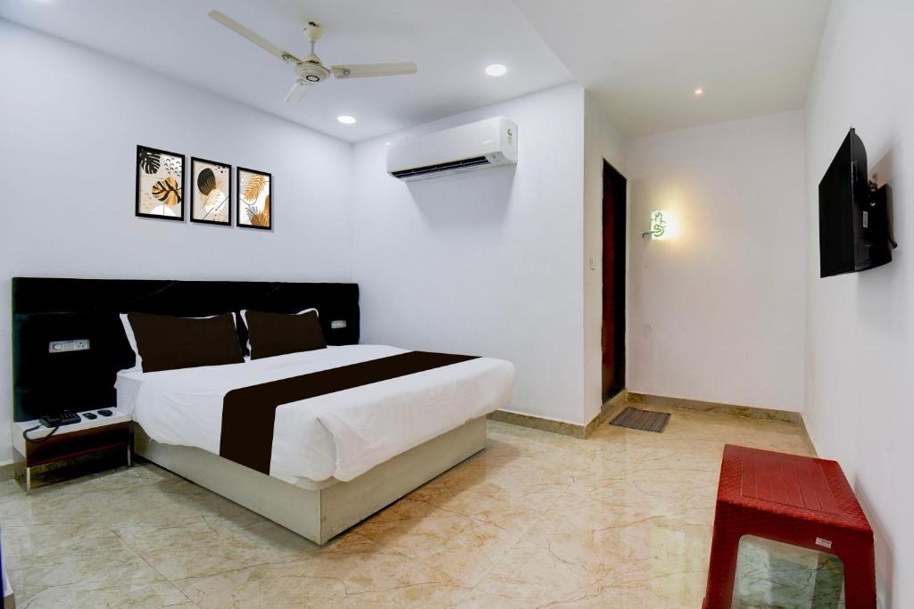 Ένα ή περισσότερα κρεβάτια σε δωμάτιο στο Hotel O DRN Palace