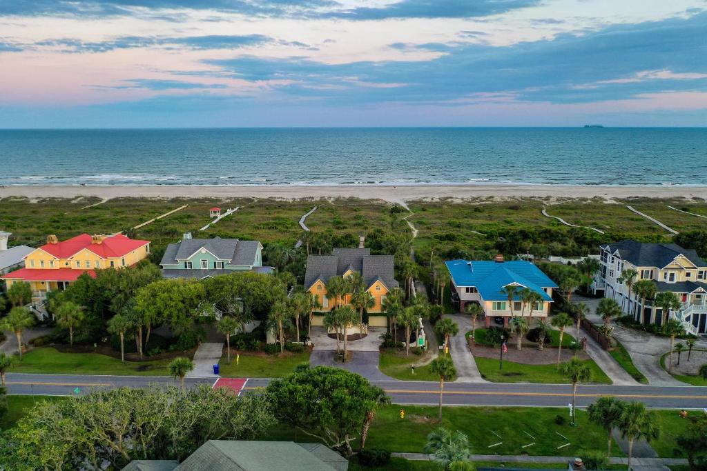 an aerial view of a beach with houses and the ocean at PALM3700: 3700 Palm Blvd. in Isle of Palms