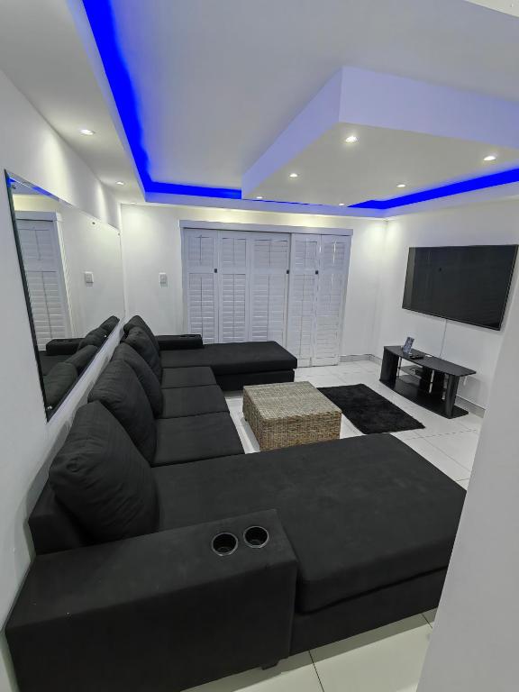 TV a/nebo společenská místnost v ubytování Summer sands north beach