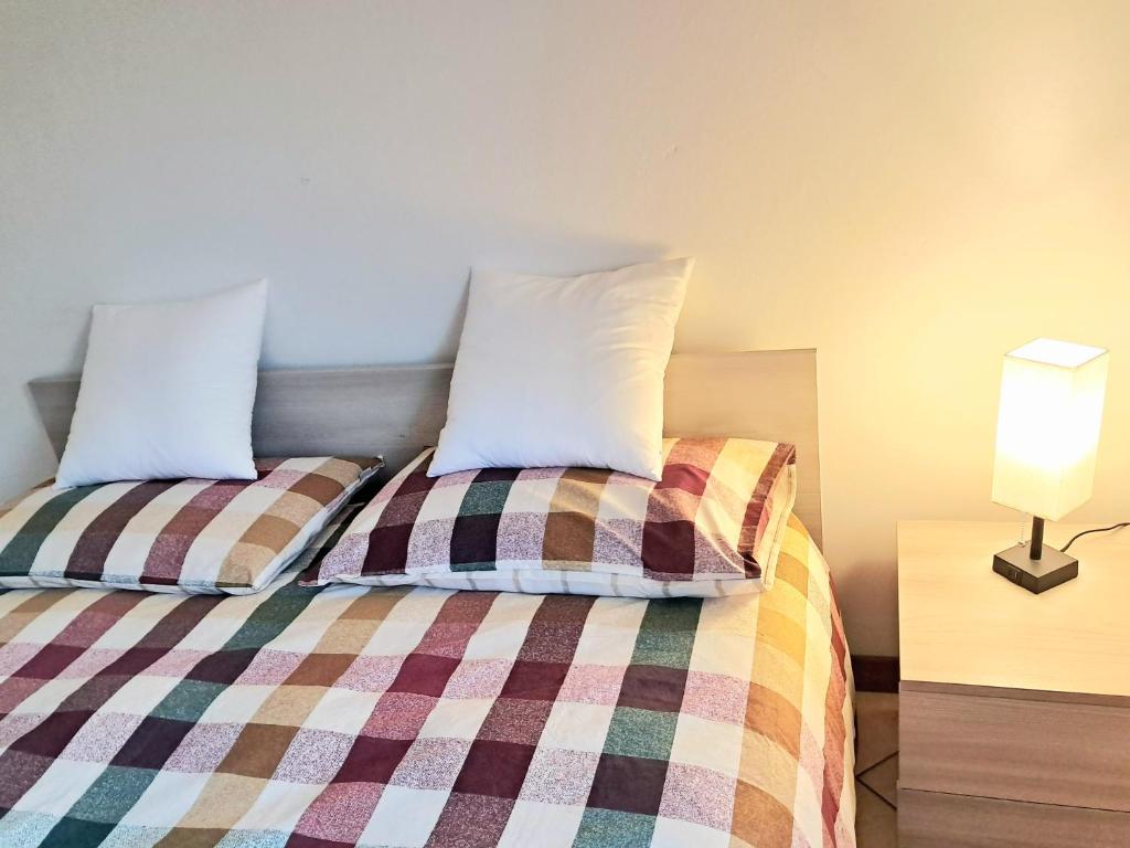 Ένα ή περισσότερα κρεβάτια σε δωμάτιο στο Tolle Easy Smart Stay