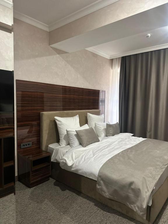 Ένα ή περισσότερα κρεβάτια σε δωμάτιο στο Nord Gate