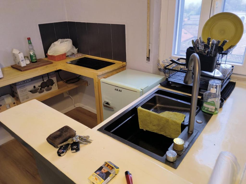 a kitchen with a sink and a counter top at saffi15 in Sannazzaro deʼ Burgondi