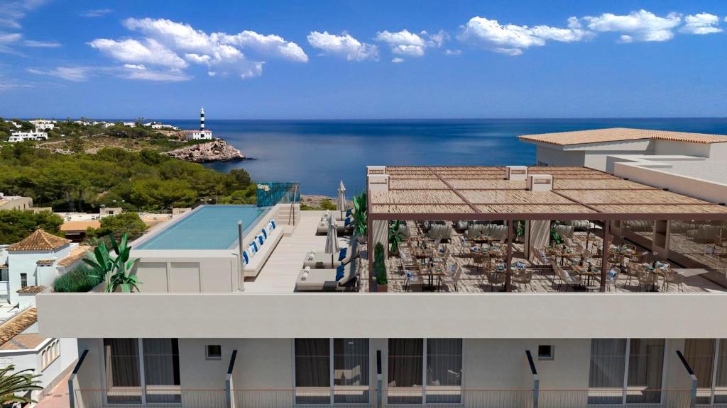a view of the ocean from a building at Smy Portocolom in Portocolom