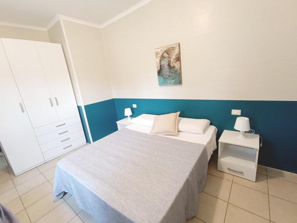 Postel nebo postele na pokoji v ubytování Spiaggiabella Resort