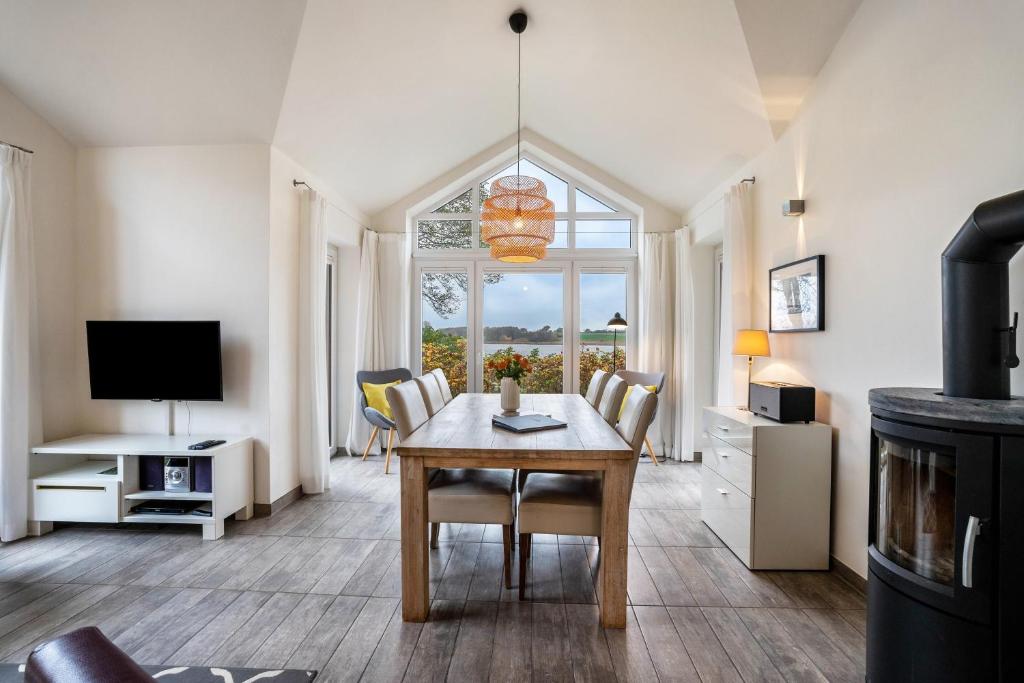 TV a/nebo společenská místnost v ubytování Weidenuferhaus