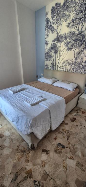 Postel nebo postele na pokoji v ubytování Casa di Pam