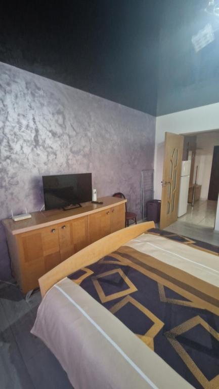 Postel nebo postele na pokoji v ubytování Apartament Faleza Dunarii