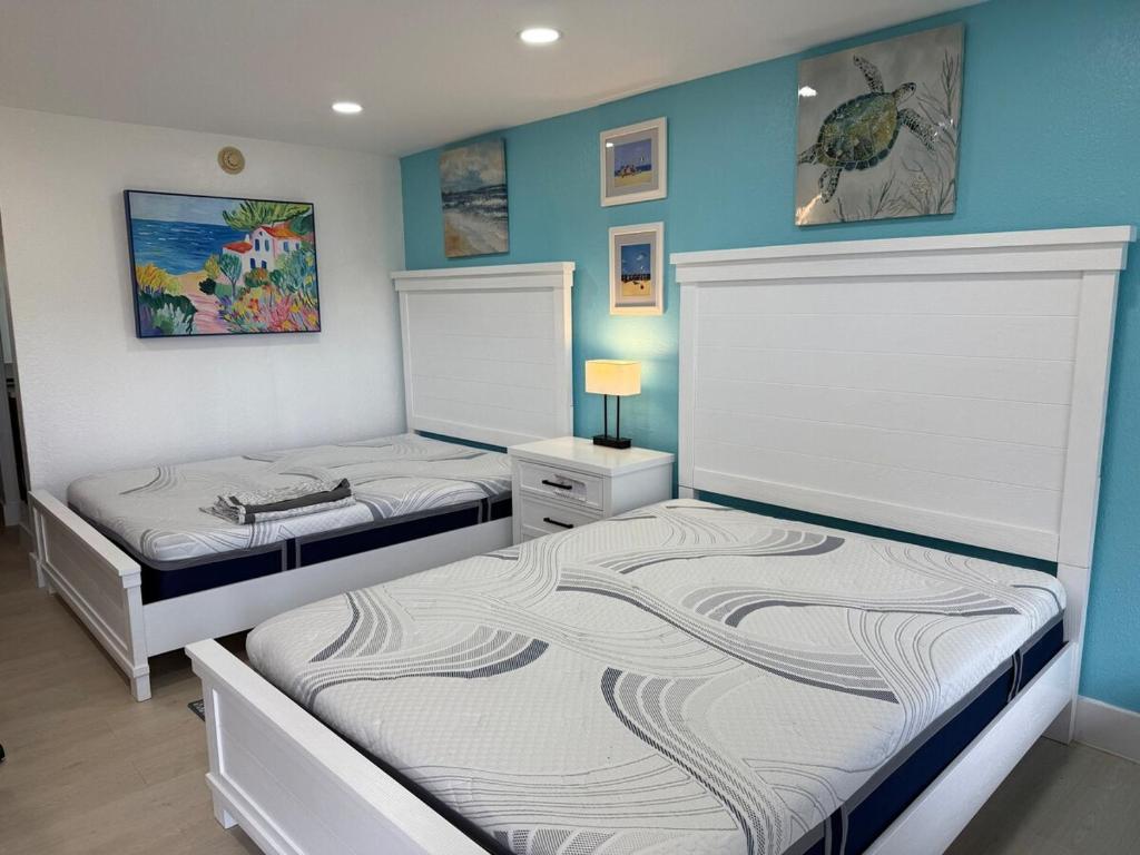 Ένα ή περισσότερα κρεβάτια σε δωμάτιο στο New Condo Room Pool Marina Near Beaches