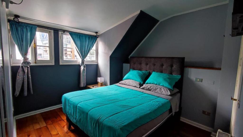 Postel nebo postele na pokoji v ubytování Hotel CR Providencia