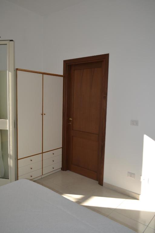 Postel nebo postele na pokoji v ubytování B&B l'Antropologo