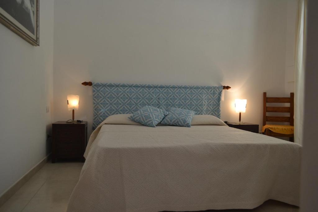 Postel nebo postele na pokoji v ubytování B&B l'Antropologo