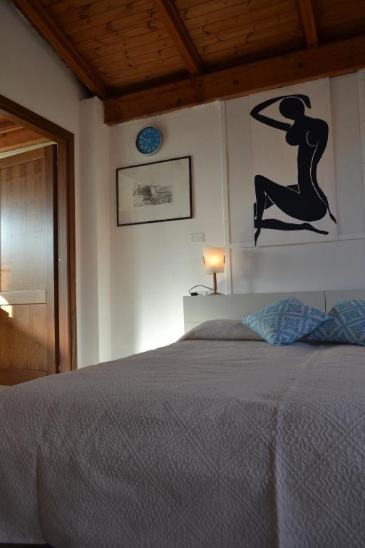 Postel nebo postele na pokoji v ubytování B&B l'Antropologo