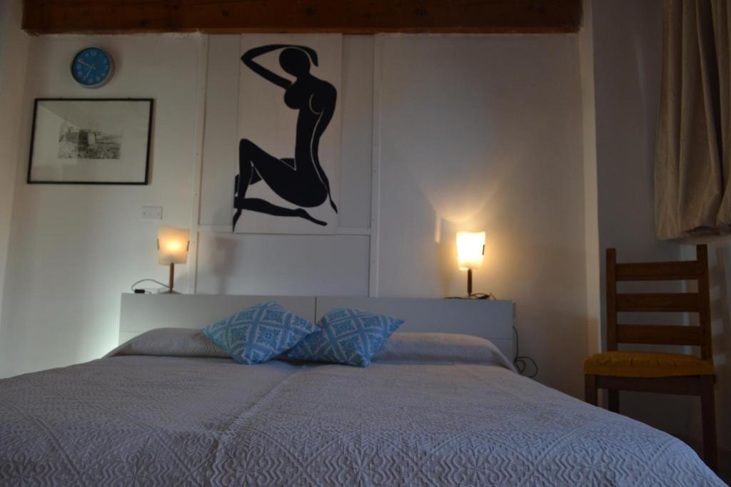 Postel nebo postele na pokoji v ubytování B&B l'Antropologo