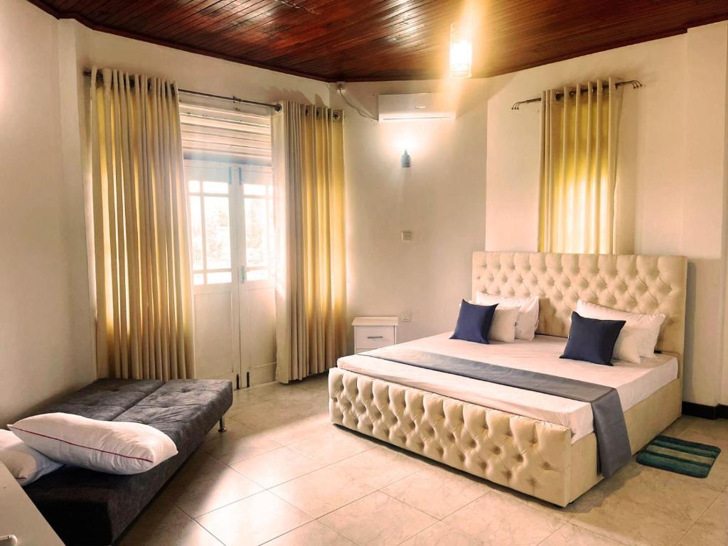 Postel nebo postele na pokoji v ubytování Peak Lodge