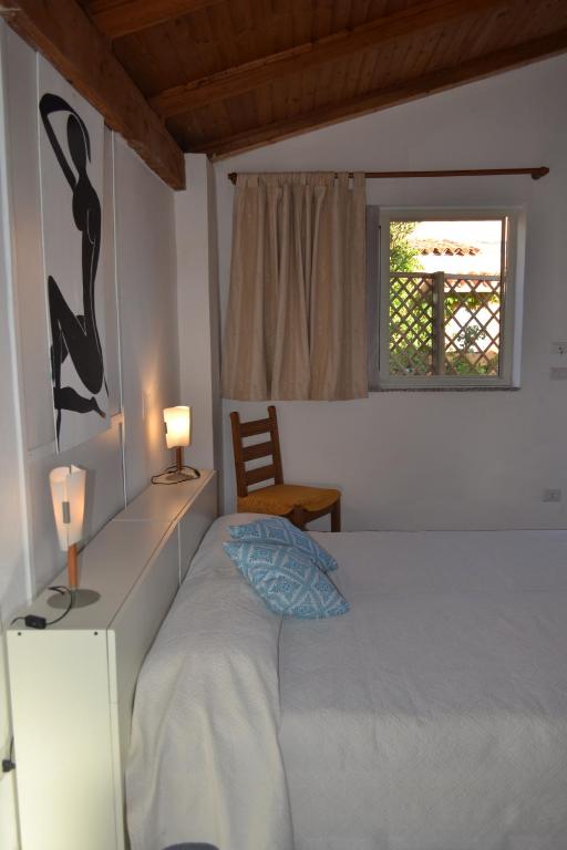 Postel nebo postele na pokoji v ubytování B&B l'Antropologo