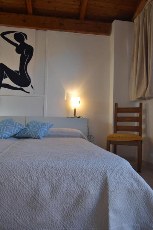 Postel nebo postele na pokoji v ubytování B&B l'Antropologo