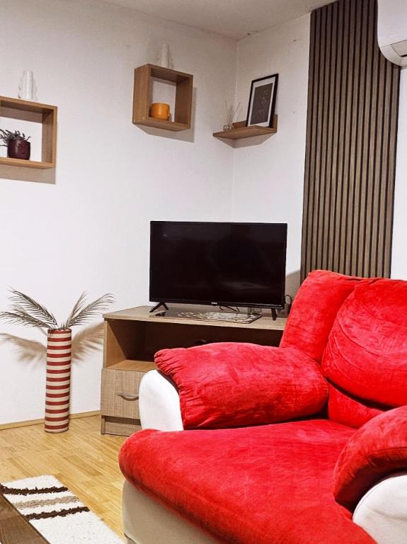 TV a/nebo společenská místnost v ubytování Apartman 053