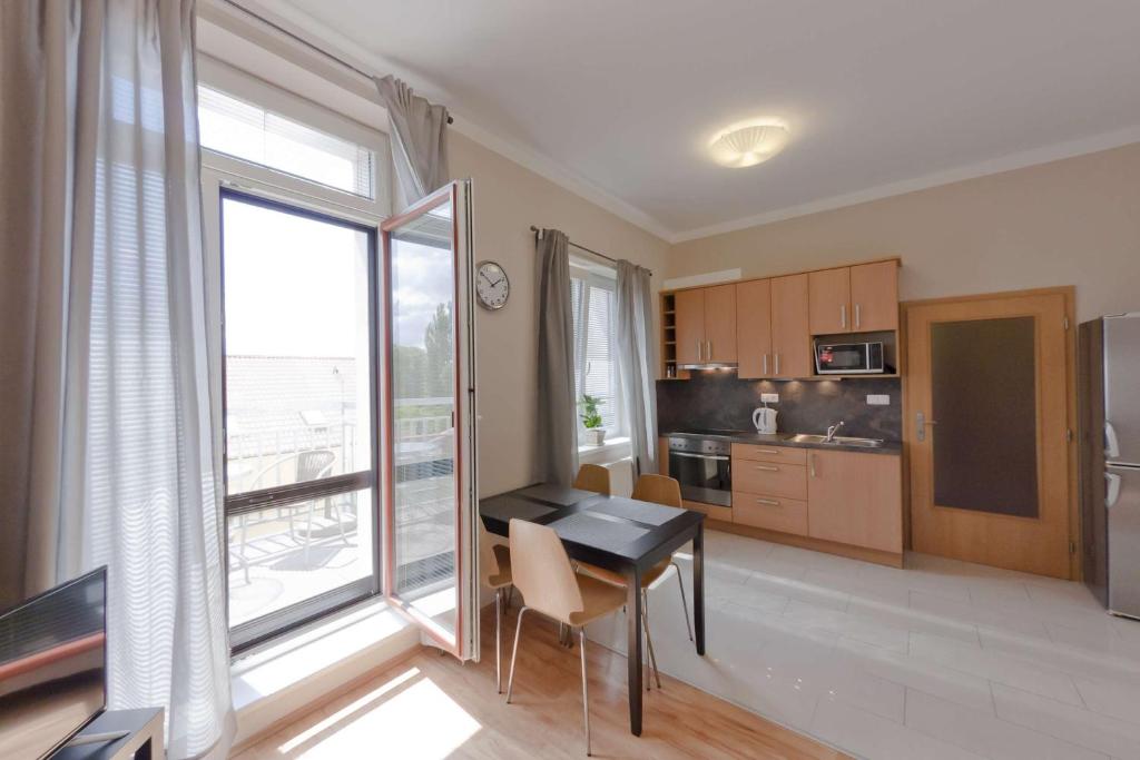 Kuchyň nebo kuchyňský kout v ubytování Penzion Apartmány Resident