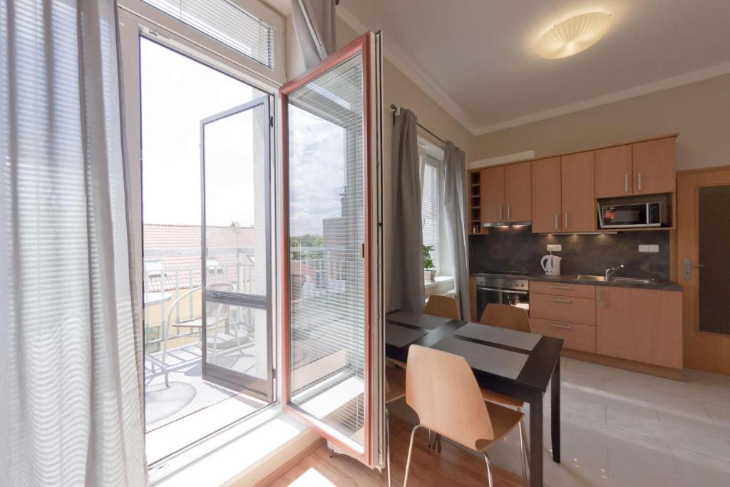 Kuchyň nebo kuchyňský kout v ubytování Penzion Apartmány Resident